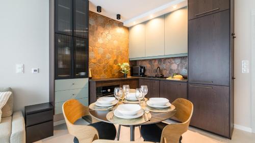 JANTAR RESORT Apartamenty PIAMOLA ze strefą sportową i grillem