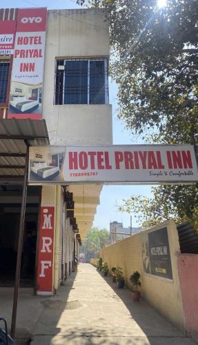 a hotel runway inn sign in front of a building at HOTEL O PRIYAL INn in Bokāro