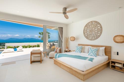 Ένα ή περισσότερα κρεβάτια σε δωμάτιο στο Bow Villa - by Sublime Samui Villas