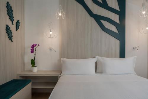 Кровать или кровати в номере Hotel Regina