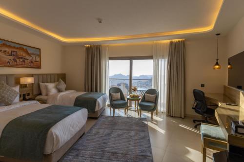 Katil atau katil-katil dalam bilik di Petra Legacy Luxury