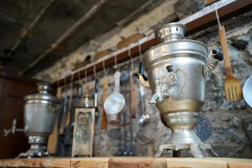 a metal appliance sitting on top of a table at The Victorian Hotel & Spa Room 1 in Yerevan