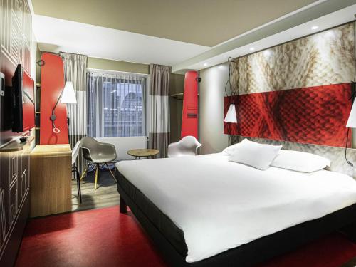 Postel nebo postele na pokoji v ubytování ibis Amsterdam Centre