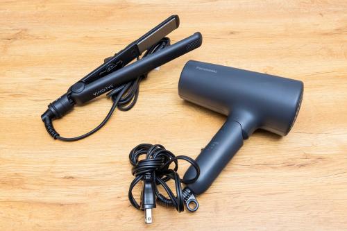 a black blow dryer on a wooden table at Shinjuku 24mins train 4BR 8 Beds 2BA in Chofu