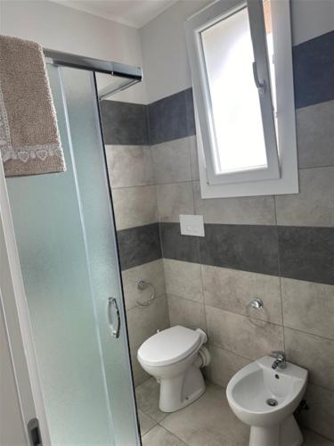 Koupelna v ubytování Frontemare