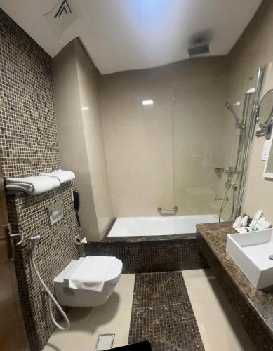 Koupelna v ubytování Tamr Inn Hotel