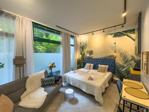 Ένα ή περισσότερα κρεβάτια σε δωμάτιο στο Fried-RICH Apartments