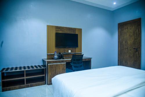 TV/Unterhaltungsangebot in der Unterkunft Le Mehol Hotel and Suites