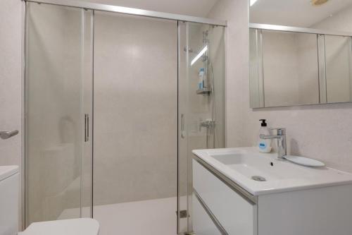 a bathroom with a shower and a sink at Casa Golf in Son Parc