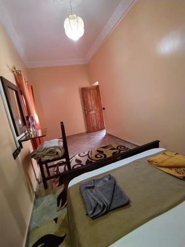 Ένα ή περισσότερα κρεβάτια σε δωμάτιο στο Sahara Dream Apartment