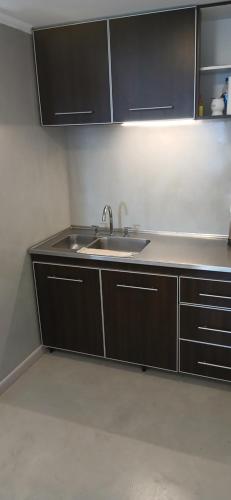 Η κουζίνα ή μικρή κουζίνα στο Loft con piscina