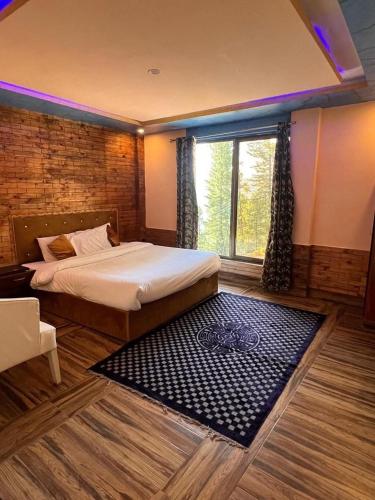 Ένα ή περισσότερα κρεβάτια σε δωμάτιο στο Green Executive Hotel