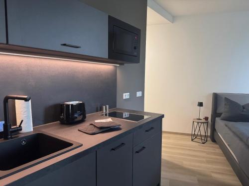 Dapur atau dapur kecil di Exklusives Wohnen im historischen Wasserturm dem Highlight von Delitzsch WE002