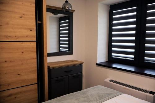 Katil atau katil-katil dalam bilik di Alinar Oasis Budget Hotel