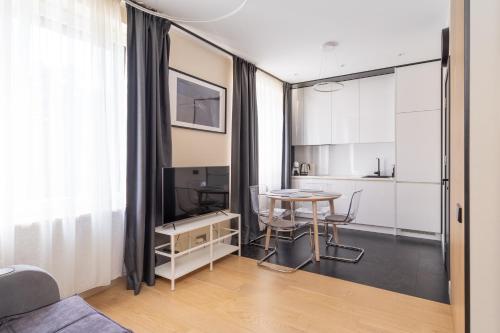 Η κουζίνα ή μικρή κουζίνα στο Forest view front line apartment on Dzintaru avenue