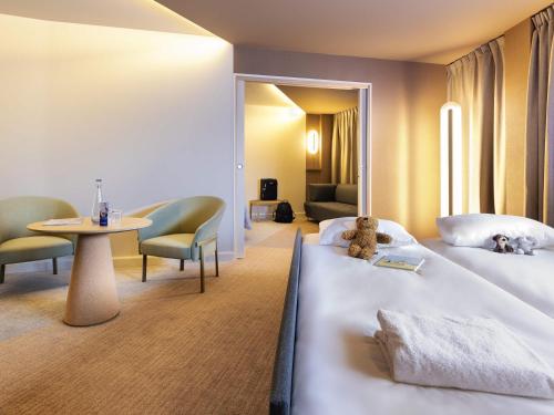 Un ou plusieurs lits dans un hébergement de l'établissement Novotel Paris Orly Rungis Aéroport