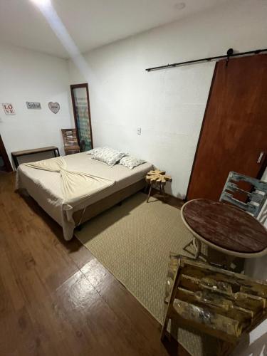 Uma cama ou camas num quarto em Cabana da Mari