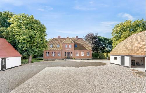 an image of a large brick house with two buildings at Large Holiday Home With Pool On South Lolland Coast in Dannemare