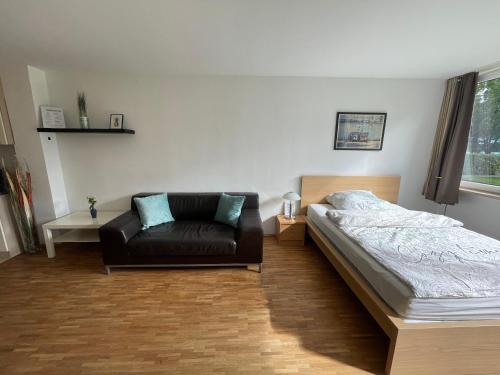 Katil atau katil-katil dalam bilik di Schnuckliges Appartment nähe Messe