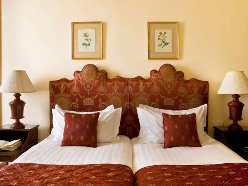 Postel nebo postele na pokoji v ubytování Sofitel Winter Palace Luxor