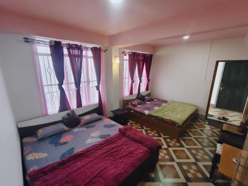 Cama o camas de una habitación en Arwah Scenic view homestay
