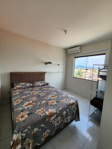 Ένα ή περισσότερα κρεβάτια σε δωμάτιο στο apartamento