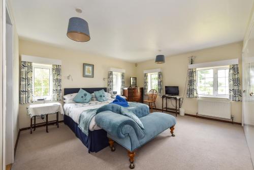 Giường trong phòng chung tại Aura Favoni, West Wittering
