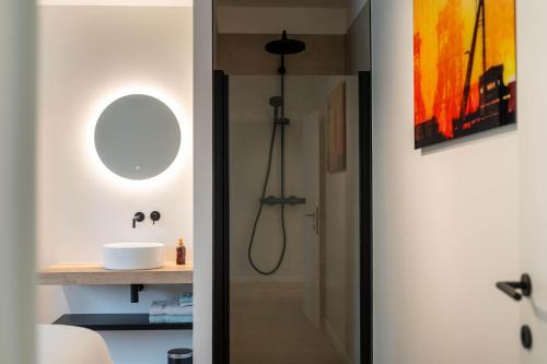 a bathroom with a shower and a sink at Villa Weidezicht in Heusden - Zolder