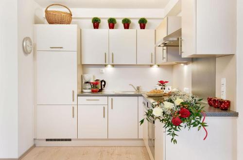 Kuchyň nebo kuchyňský kout v ubytování Appartement Alpen Lodge
