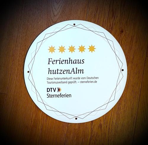 hutzenAlmに飾ってある許可証、賞状、看板またはその他の書類
