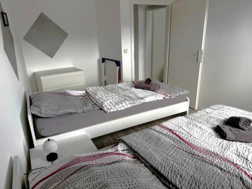 Spacious Apartment in Eschweilerにあるベッド