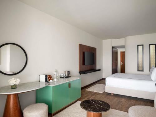 Ένα ή περισσότερα κρεβάτια σε δωμάτιο στο Hotel Novotel Sharm El-Sheikh
