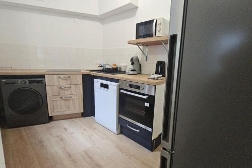 Η κουζίνα ή μικρή κουζίνα στο La Parenthèse Havraise