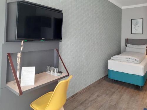 Cama o camas de una habitación en Garner Hotel Vienna by IHG