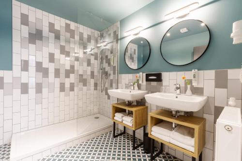 Un baño de Garner Hotel Vienna by IHG