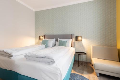 Cama o camas de una habitación en Garner Hotel Vienna by IHG