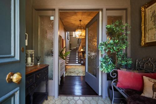a hallway with a door leading to a room at Merlindale in Crieff