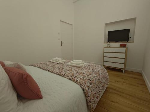 Un ou plusieurs lits dans un hébergement de l'établissement APPARTEMENT 4 CHAMBRES loft industriel