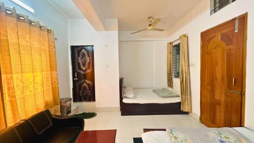 Postel nebo postele na pokoji v ubytování Hotel Prime Inn Mirpur