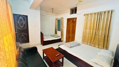 Postel nebo postele na pokoji v ubytování Hotel Prime Inn Mirpur