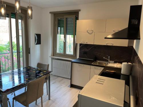 Kuchyň nebo kuchyňský kout v ubytování Appartamento panoramico in collina