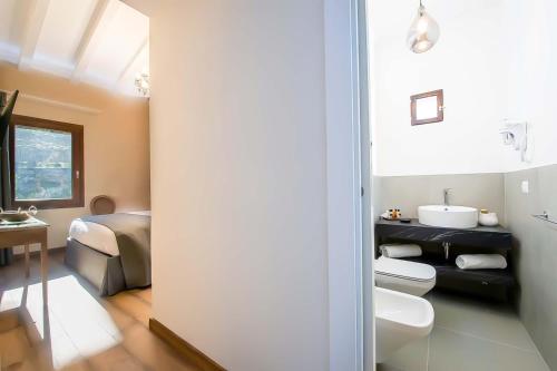 Ένα ή περισσότερα κρεβάτια σε δωμάτιο στο AMORE RENTALS - Villa Mia