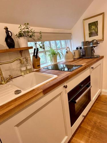 Η κουζίνα ή μικρή κουζίνα στο Cotswolds Retreat