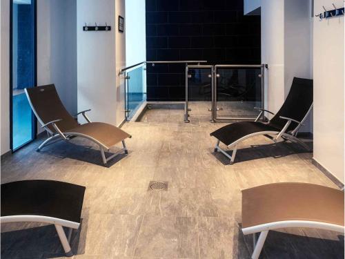 Χώρος καθιστικού στο Hôtel Mercure Saint-Nectaire Spa & Bien-être