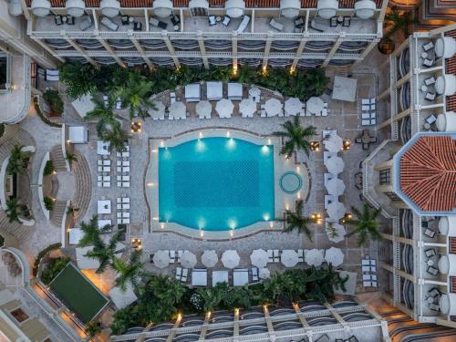 an overhead view of a pool at a resort at Sofitel Legend Santa Clara Cartagena in Cartagena de Indias