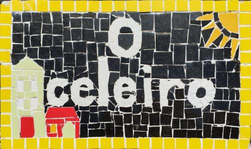 a painting of the word electricity on a wall at O Celeiro