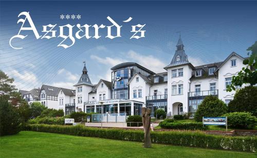 a large white building with the words akari x at Hotel Asgards Midgard in Zinnowitz