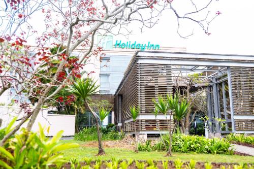 a building with a sign that readshaver jam at Holiday Inn Mauritius Mon Trésor by IHG in Blue Bay