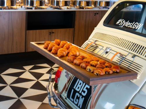 a tray of donuts on the back of a car at ibis Styles London Gatwick Airport in Crawley