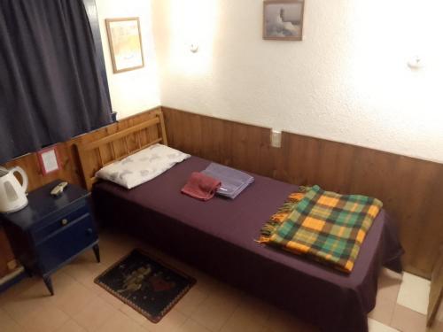 Katil atau katil-katil dalam bilik di Abra Marina Hotel